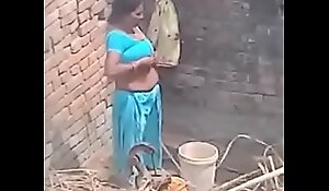 My Neighbour aunty Medicine lavage in the same manner her beamy boobs.