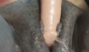 Spray with fake penis hairy cunt