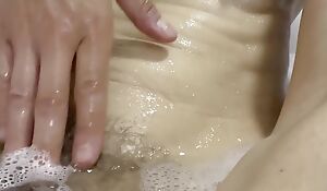 Female orgasm in the bath