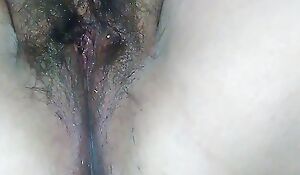 Horny hairy cunt plays anent the brush clit