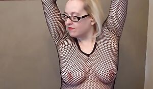 Blinking in Fishnet Pantyhose together with Fishnet Body Stocking