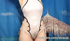 Bixanie in wet see-through bikini shows the nipples and the pubic hair
