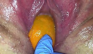 Tight vagina milf gets her vagina destroyed with a orange and borough popping redness out of her tight hole making her squirt